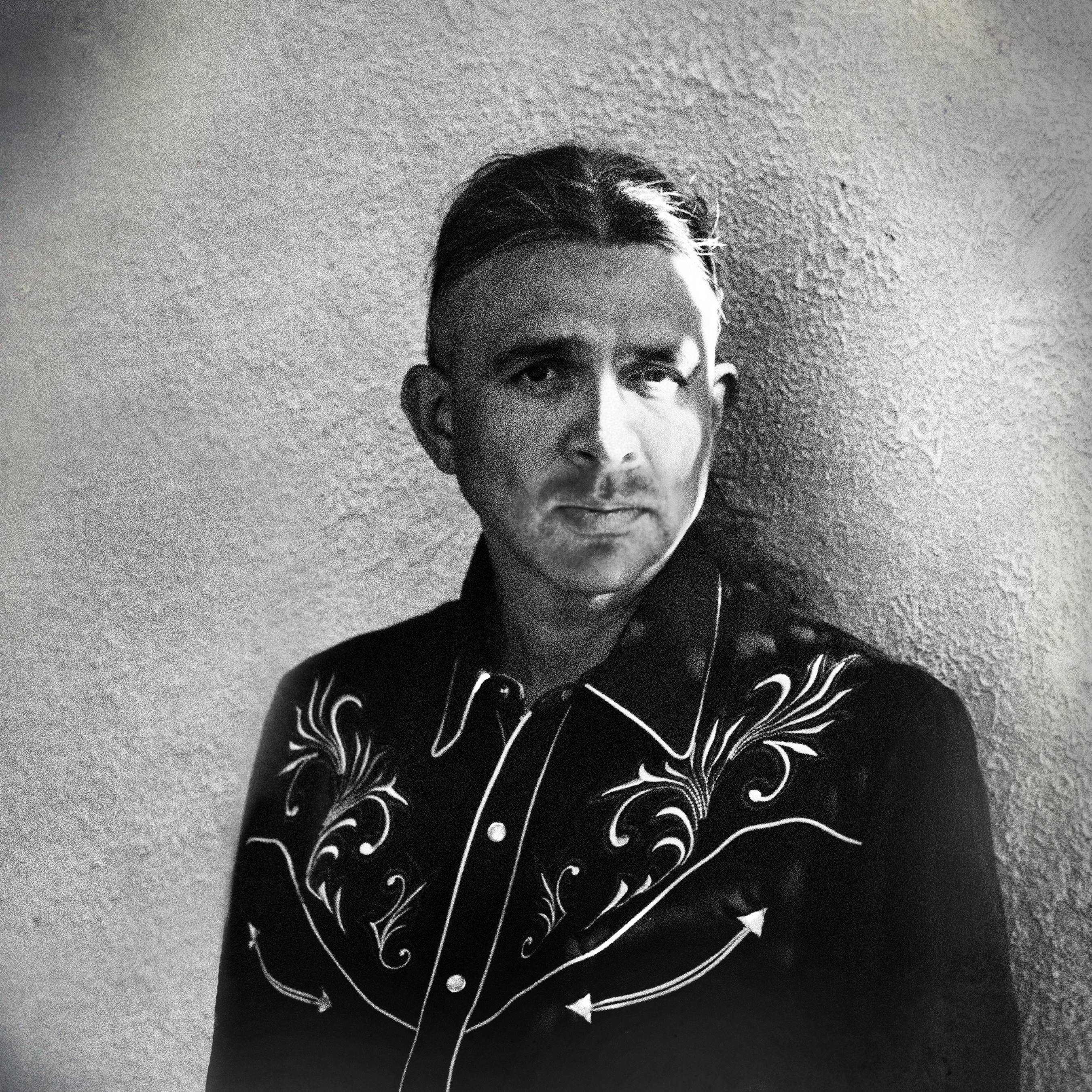Author Stephen Graham Jones head shot in black and white