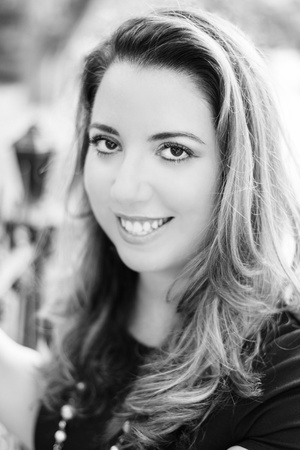 Black and white photo of author Chanel Cleeton