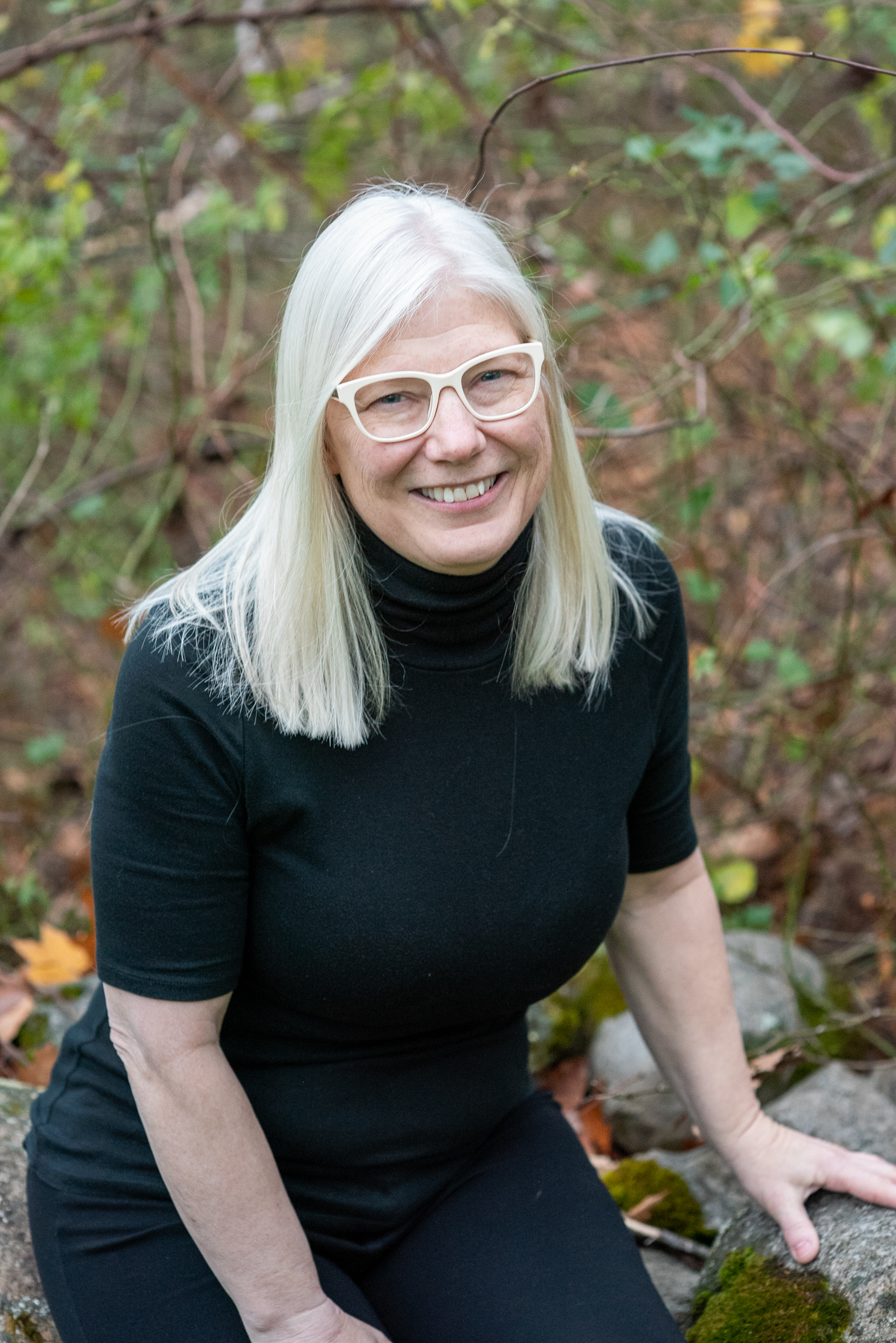 Headshot of seated female author Devoney Looser