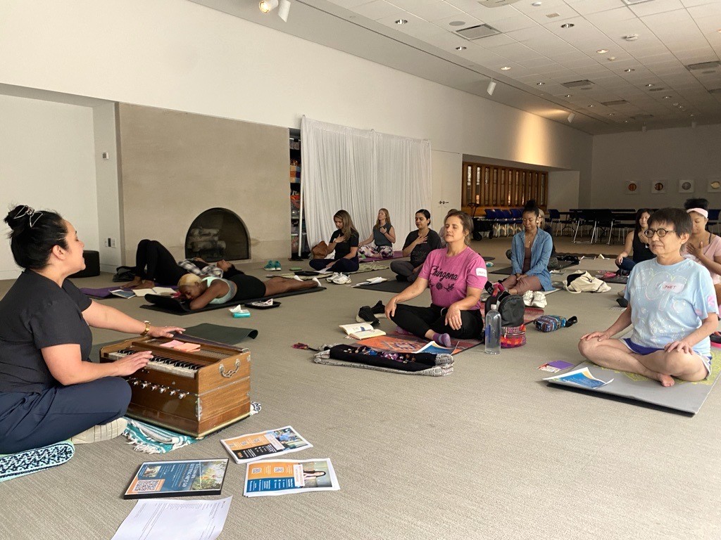 Participants engaged in wellness workshop.