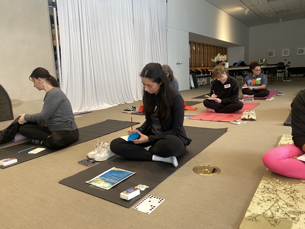 Participants engaging in a journaling activity.