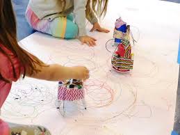 Children engaging in art activity.