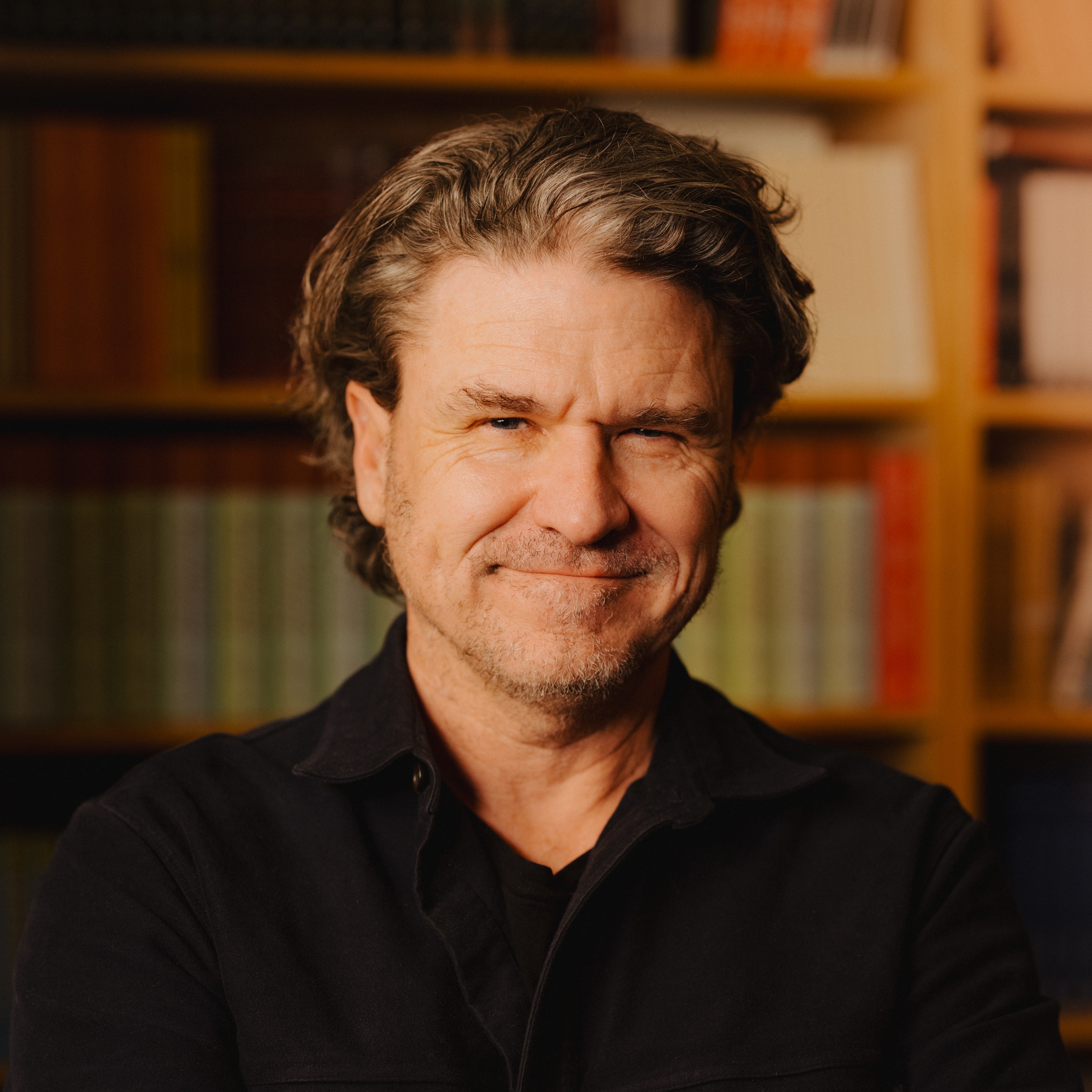 Headshot of author Dave Eggers